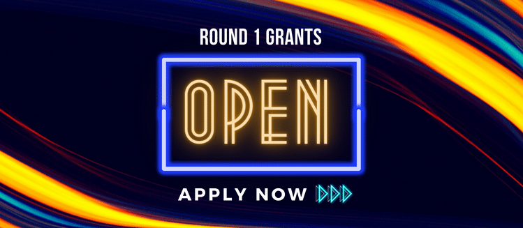 Neon sign that reads round 1 grants open apply now