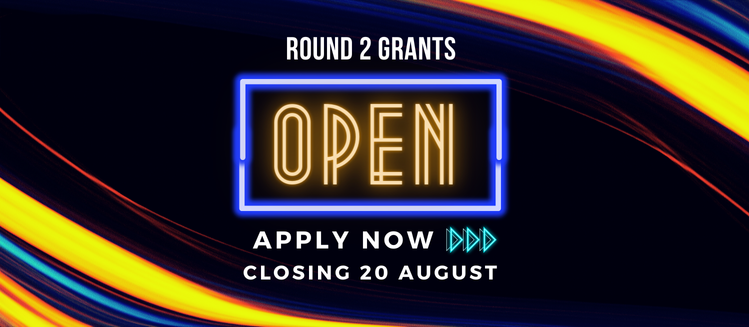 A rectangular digital banner with yellow luminscent lights on the corners featuring text that reads Round grants open apply now closing 20 August