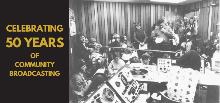 Golden text that reads Celebrating 50 years in community broadcasting on a black background next to a black and white photograph of a crowd of men women and children inside the studio of a radio station with wooden walls and old tape machines and microphones